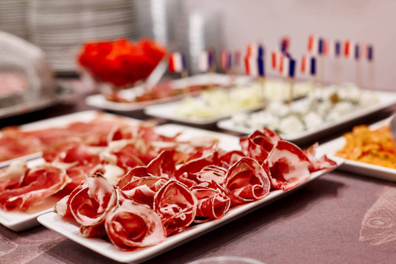 Beautifully designed buffet in the hotel restaurant with carefully thinly sliced meat,
